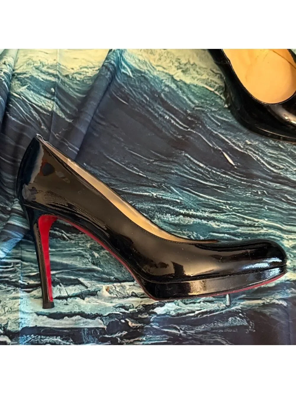 Christian Louboutin sleek christian